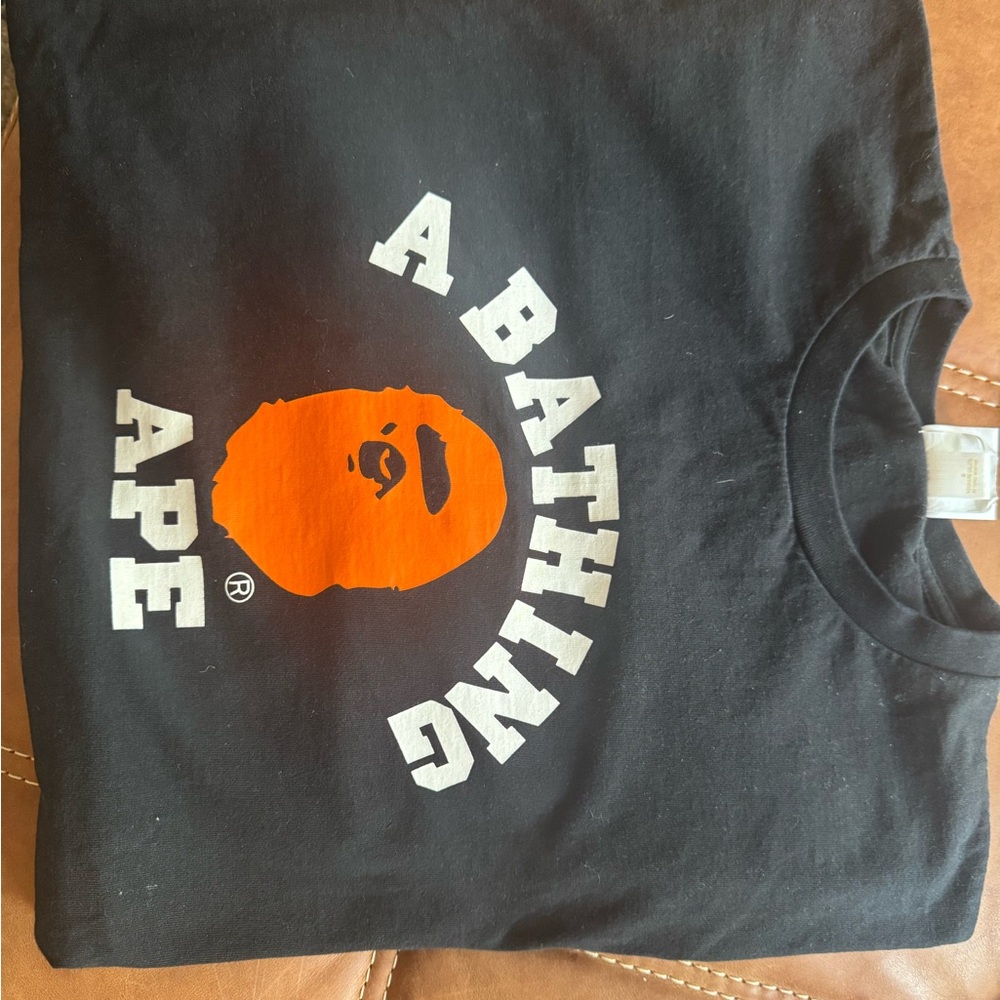 A Bathing Ape Black T-Shirt with Orange Logo